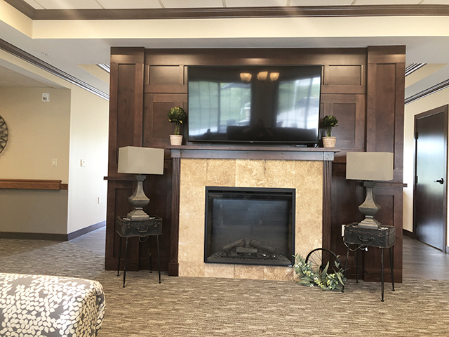 Memory care fireplace common area